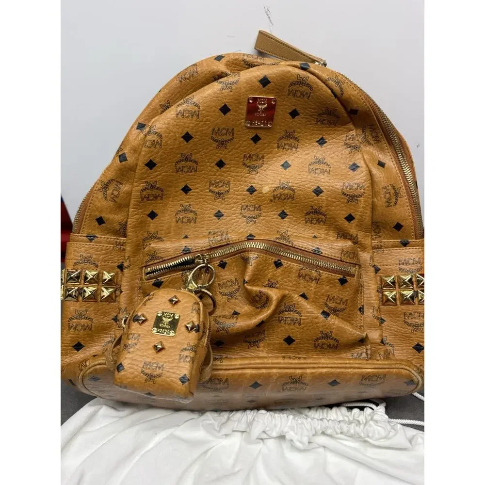 MCM Stark Side Studs Medium Cognac Visetos Backpack Pouch Dust Bag